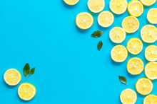 Lemon Slices Frame On Yellow Background Top View Space For Text