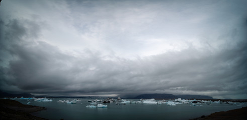 Wall Mural - Fragments of iceberg in sea water. Iceland north sea