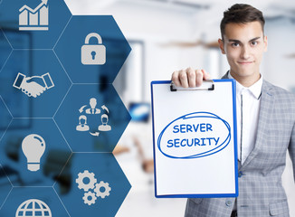 Business, technology, internet and network concept. Young businessman shows a keyword: Server security