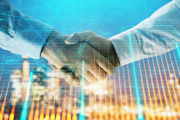 Double exposure of financial chart on cityscape background with two businessmen handshake. Concept of financial analysis and investment opportunities