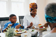© Gerald Carter/Creative Flame - Family eating dinner together