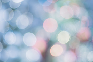 Leinwandbilder - Abstract color blur decoration ball and light string on christmas tree with bokeh light background.winter holiday seasonal