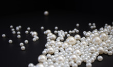 Bunch Of Multi Size Pearls On A Background.Glamorous Pearls Milky-way.luxury Lifestyle.Holiday Decoration.Nice And Shiny Romantic Morning.Love And Success.