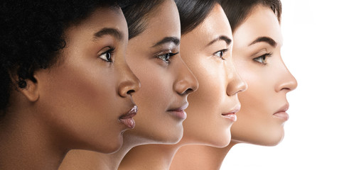 Wall Mural - different ethnicity women - caucasian, african, asian and indian.