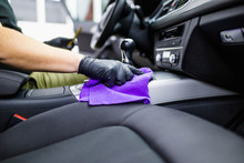 A Man Cleaning Car Interior, Car Detailing (or Valeting) Concept. Selective Focus.