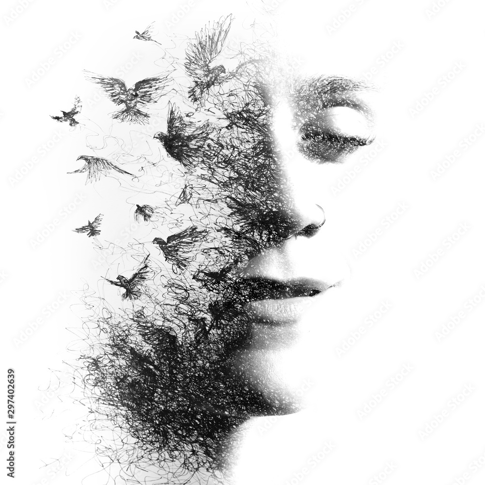 Double Exposure portrait of an elegant woman with closed eyes combined with  hand made pencil drawing of a flock of birds flying freely resembling  disintegrating particles of her being, black Stock Photo |, image size:1000x1000