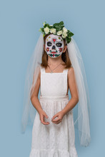 Girl Portraying A Dead Bride With Face Painting On Halloween