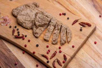 Fake meat. Meat analogue (also called  alternative, substitute, mock, faux, imitation, vegetarian, vegan) meat. Wheat gluten, also called seitan, mianjin, milgogi, gluten meat.