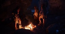 Wild Cavemen Neanderthals Wearing Animal Skin Get Out Of The Cave At Dark Night Near Fire Stone Fun Ancient History Portrait Evolution Homo Sapiens Primitive Campfire Slow Motion