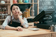 © PR Image Factory - startup business owner woman waiting for customers leaning on bar counter with hands on chin. upset asian japanese lady waitress feels bored and depressed with bad poor finance in cafe restaurant.
