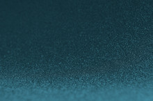 Dark Blue Sparkle Glow Bokeh Texture As Background.