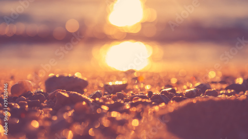 Copy space of soft sand sea and blur tropical beach with sunset sky and cloud...