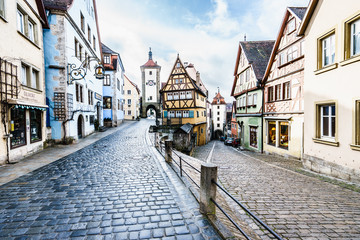 Canvas Print - ROTHENBURG OB DER TAUBER, GERMANY - MARCH 05: Typical street on March 05, 2016 in Rothenburg ob der Tauber, Germany. It is well known for its well-preserved medieval old town.