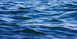 © photolink - Blue sea water background texture