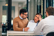 © bnenin - Adviser explaining conditions of a document with bad news to a couple.
