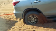 Car Tire Stuck In Sand Offroad