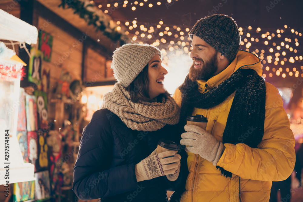 Photo of two people cute couple husband guy wife lady drink hot beverage x-mas eve spend time magic land newyear shopping market buying gifts wear coats outside - obrazy, fototapety, plakaty 