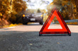 © AKGK Studio - Red triangle, red emergency stop sign, red emergency symbol and black car stop and park on road.