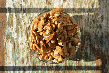 organic walnuts on wooden background