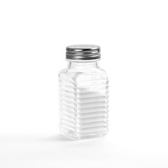 Wall Mural - Glass salt shaker. Close up. Isolated on white background