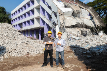 Wall Mural - Demolition control supervisor and contractor on demolish building.