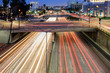© chones - Downtown Los Angeles traffic at night. Long exposure car light trails