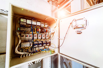 Electrical panel at a assembly line factory. Controls and switches.