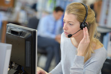Woman Working In Call Center Serious Expression
