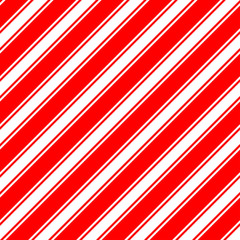 Wall Mural - Christmas Candy Cane Stripes Seamless Vector Pattern in Red and White. Popular Winter Holiday Backdrop. Variable Width Stripes. Diagonal Lines Background. Repeating Tile Swatch Included.