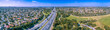 Wide aerial panorama of Monash Freeway passing through Wheelers hill suburb in Melbourne, Australia