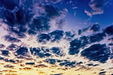 Wall Mural - Fluffy Clouds In Blue Sky Background (Oil Paint filter)