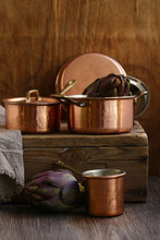 Copper Utensils, Pots, Ladle And Pan On Wooden Background