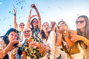 group of happy people mixed ages generations women having fun all together during celebration party 