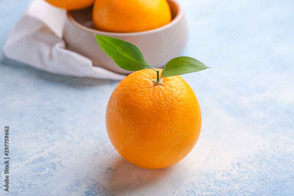 Fresh orange on color background