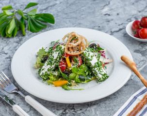 Wall Mural - vegetable salad with white cheese, bell peppers, arugula, cucumber, tomato