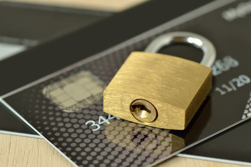 Padlock on credit card - Concept of security and protected paying