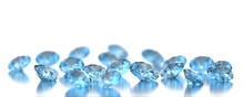 Group Of Blue Diamonds Gems Placed On White Glossy, 3d Illustration Soft Focus.
