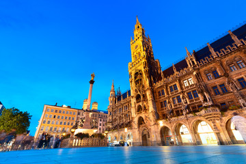 Wall Mural - Night view of the main attraction of Munich and all of Bavaria - illuminated building of the New Town Hall at night. Tourism and Travel to Germany concept