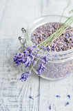 Fototapeta Lawenda - natural lavender flowers and dried lavender buds in a glass jar