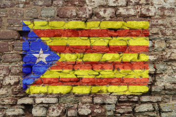 Catalonia flag on old dirty wall