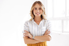 Image Of Attractive Elegant Blonde Woman Standing In White Office