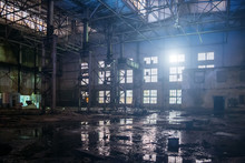 Dark Dirty Flooded Dirty Abandoned Ruined Industrial Building With Water Reflections At Night