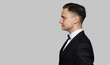 © spaxiax - Side profile view portrait of a man in black jacket. Isolated