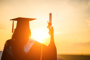 Wall Mural - Graduates wear a black hat to stand for congratulations on graduation