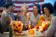 © luckybusiness - people in costume celebrate together a halloween party