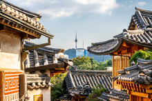 Bukchon Hanok Village In Seoul With View On Traditional Houses Roofs And Tower In The Distance In South Korea