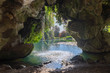 Inside a cave behind waterfall, tropical nature beauty