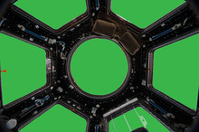 Porthole Of Space Station Isolated On Green Background. Elements Of This Image Furnished By NASA.