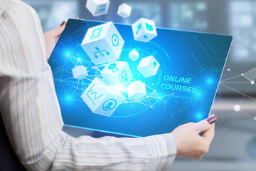 business, technology, internet and network concept. young businessman shows the word: online courses