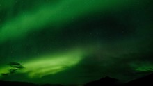 Northern Lights Aurora Borealis, Time Lapse Over Icelandic Night Sky